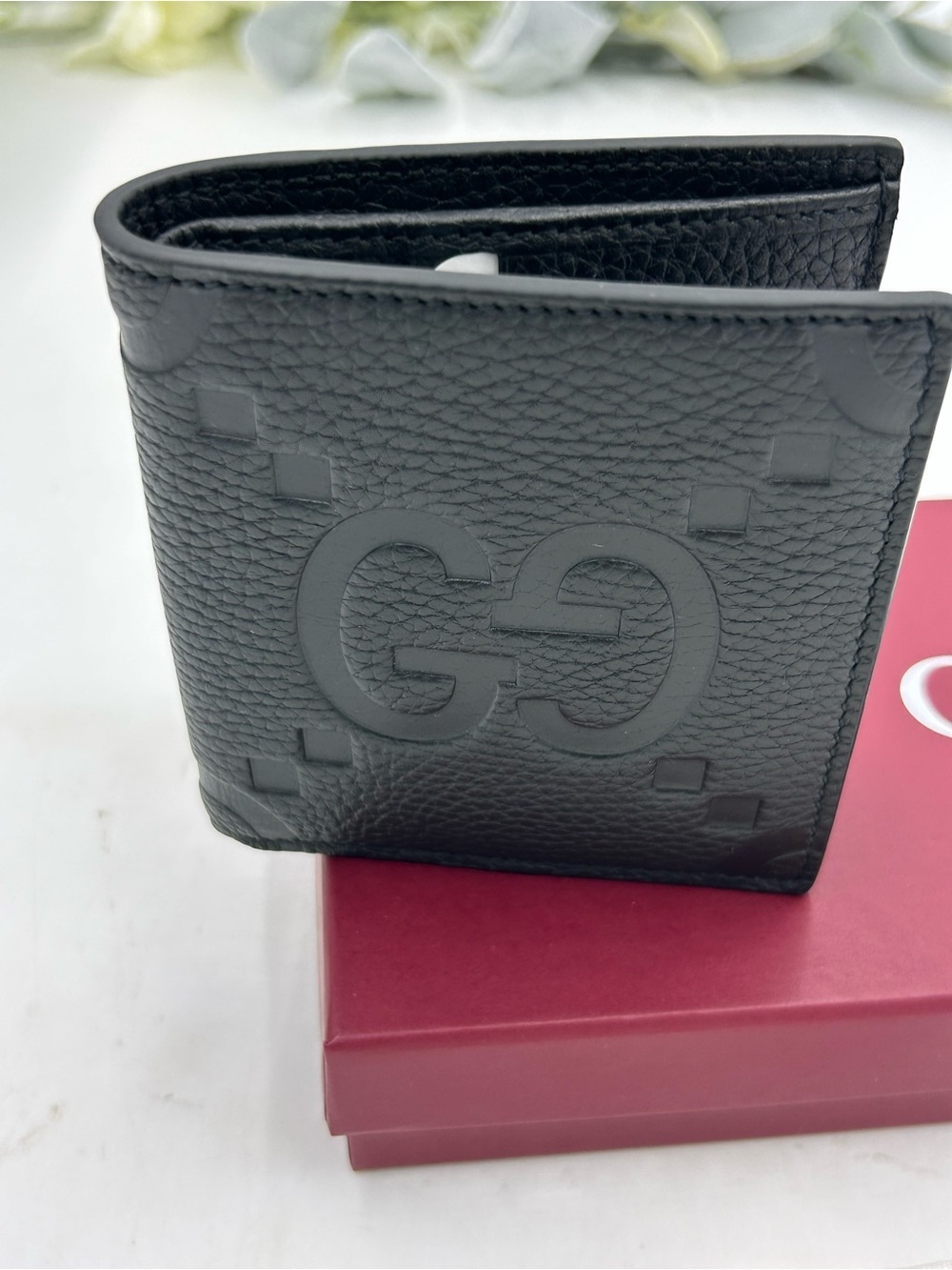 Men's Gucci jumbo GG Leather bifold wallet made in Italy